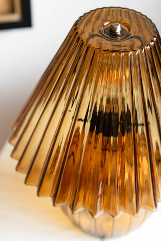 Close-up image of the Ribbed Amber Glass Table Lamp