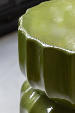 Close-up of the top of the Ribbed Edge Round Side Table in Green Glaze.