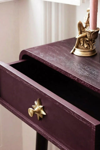 Close-up image of the Ringo Console Table in Deep Plum