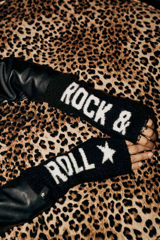 The Rock & Roll Handwarmers shown worn against leopard velvet, with a black leather jacket. 