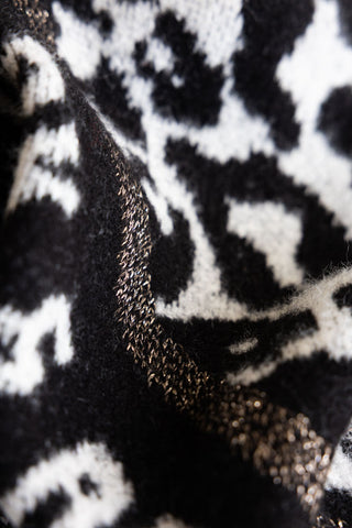 Close-up image of the Rock & Roll Monochrome Animal Print Scarf