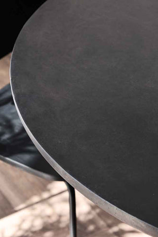 Close-up image of the Round Indoor/Outdoor Dining Table In Cocoa