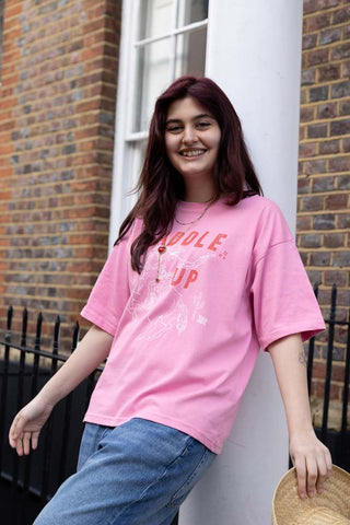 Image of the Saddle Up Pink Cowboy T-Shirt - Available in 6 Sizes on a model