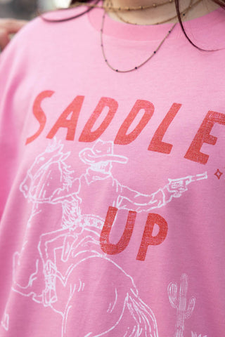 Close-up image of the print on the Saddle Up Pink Cowboy T-Shirt - Available in 6 Sizes
