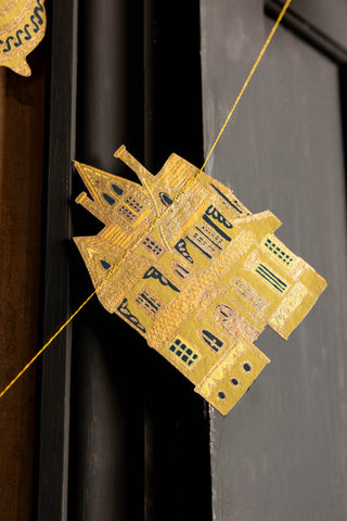 The haunted house on the Samhain Sewn Paper Halloween Garland. 