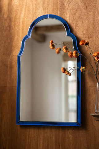 Image of the Sapphire Blue Moroccan-Style Wall Mirror on a wall