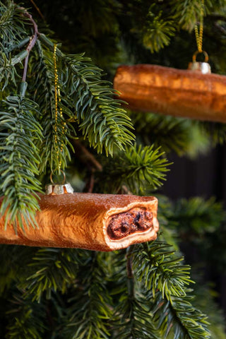 Image of the Sausage Roll Glass Christmas Tree Decoration on a Christmas Tree