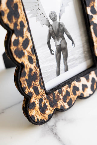 The corner of the Scalloped Leopard Print Photo Frame. 