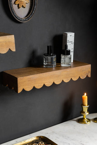 Lifestyle image of the Scalloped Wooden Wall Shelf