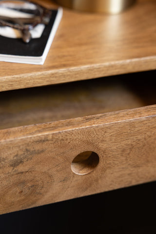 The drawer handle of the Secret Nook Wall Shelf With Drawer. 