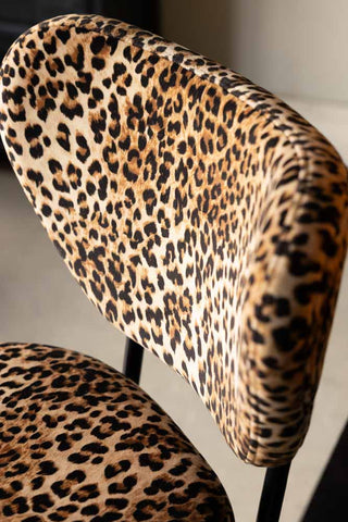 Close-up of one of the Set Of 2 Adjustable Bar Stools in Leopard Print Velvet.