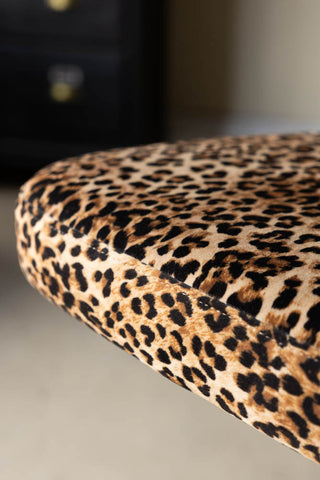 Close-up of the seat of the Set Of 2 Adjustable Bar Stools in Leopard Print Velvet.