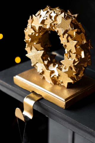 Detail image of the Set Of 2 Gold Stars Stocking Holders
