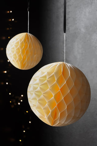 Lifestyle image of the Set Of 2 Ivory Honeycomb Ball Decorations