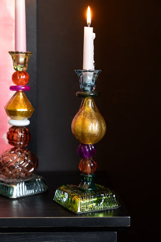 Lifestyle image of the Set Of 2 Quirky Coloured Glass Candlesticks
