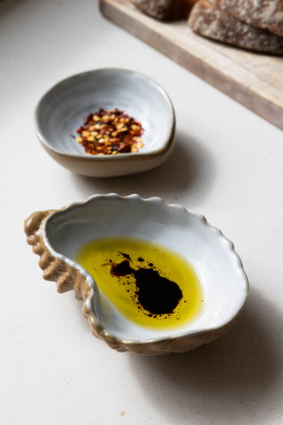 Lifestyle image of the Set Of 2 Shell Salt & Pepper Bowls