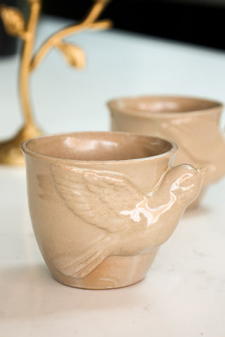 Lifestyle image of the Set Of 2 Taupe Bird Mugs