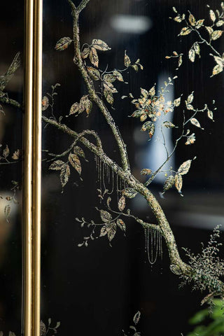 Detail of the chinoiserie pattern on the mirrored panels of the Set of 3 Framed Rectangular Chinoiserie Decorative Mirrors. 