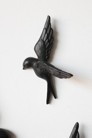 Close-up image of the Set Of 4 Black Bird Wall Ornaments