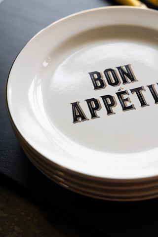The Set Of 4 Bon Appetit White Bistro Side Plates seen from above.