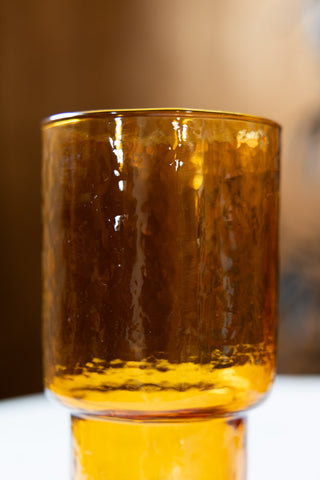Close-up image of the Set Of 4 Stackable Amber Glass Tumblers