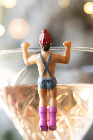 Image of the Set Of 6 Apres Ski Wine Glass Charms on a glass