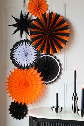 Lifestyle image of the Set Of 7 Black & Orange Paper Decorations