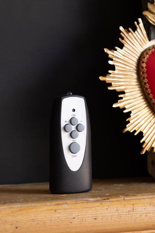 Image of the remote control for the Set of 10 LED Dinner Candles