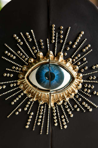 The eye and beaded detailing on the Set of 2 Black Mystic Eye Bookends.