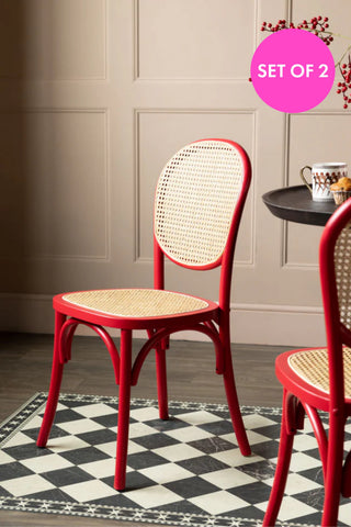 Lifestyle image of the Set of 2 Chez Pitou Wood & Woven Cane Dining Chairs in Red