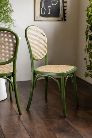 Lifestyle image of the Set of 2 Chez Pitou Wood & Woven Cane Dining Chairs in Green