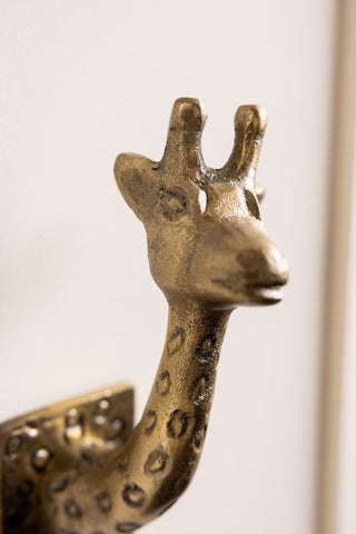 Close-up of one of the Set of 2 Gold Giraffe Coat Hooks.