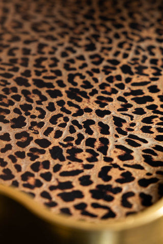Close-up of the surface of one of the Set of 2 Gold & Leopard Serving Trays.