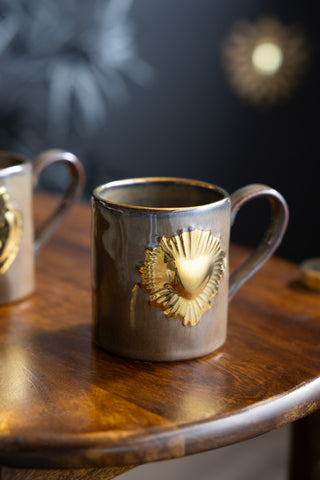 Lifestyle image of the Set of 2 Milagro Heart Glazed Mugs