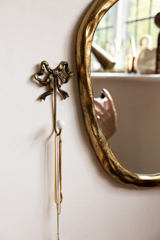 Detail image of the Set of 2 Pretty Gold Bow Wall Hooks