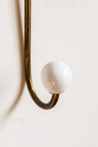 Image of the finish on the Set of 2 Pretty Gold Bow Wall Hooks