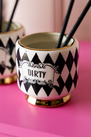 Close up of the dirty tumbler from the Set of 2 Spicy & Dirty Cocktail Cups.