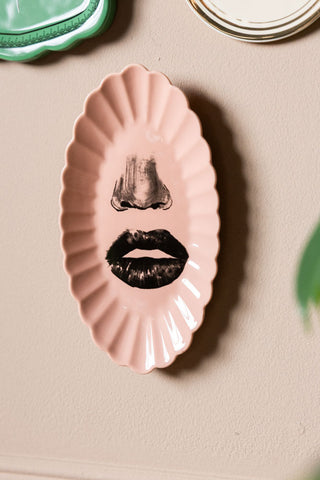 Close-up of the nose/lips plate from the Set of 3 Colourful Face Wall Plates.