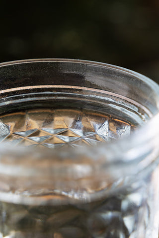 Close-up of the edge of a glass tumbler.