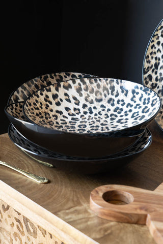 The Set of 4 Leopard Print Pasta Bowls shown stacked on a worktop. 