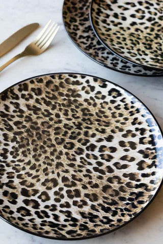 A close up image of the Set of 4 Leopard Print Dinner Plates.