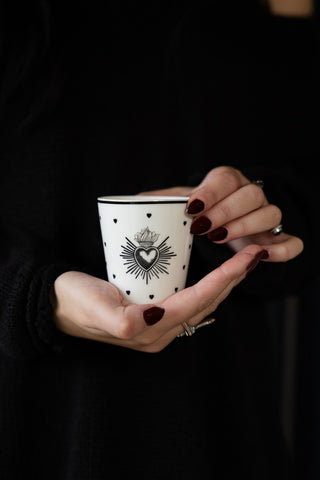 Person holding the Set of 4 Milagro Heart Ceramic Cups