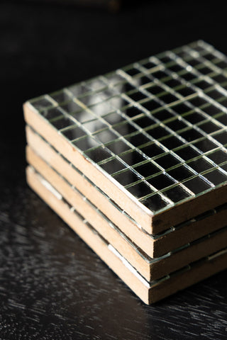 The Set of 4 Silver Disco Mosaic Coasters shown stacked. 