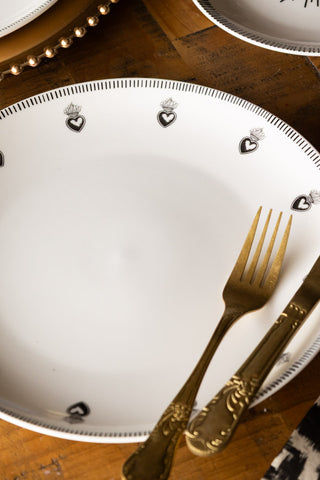 Detail image of the Set of 4 White Dinner Plates with Heart Edge Detail