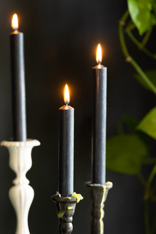 Lifestyle image of the Set of 6 Dinner Candles In Charcoal