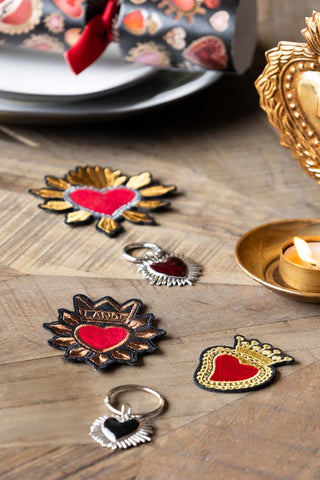 Image of the contents inside of the Set of 6 Rockett St George Luxury Milagro Christmas Crackers