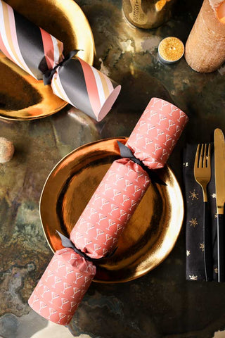 Image of the Set of 6 Rockett St George Cocktail Luxury Christmas Crackers on a table setting