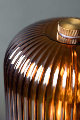 Close-up image of the Amber Seventies Glass Table Lamp