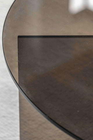 Close-up of the top of the Seventies Smoked Glass Oval Coffee Table.