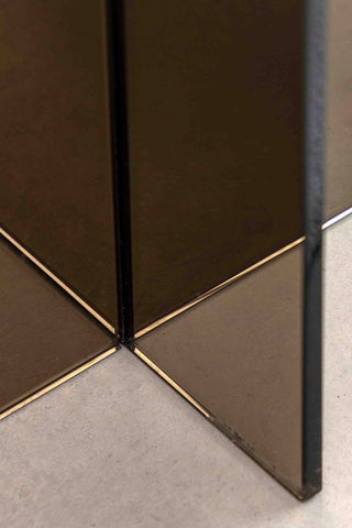 Close-up of the base of the Seventies Smoked Glass Side Table.